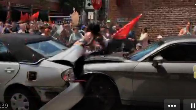 In this still image from a video obtained from social media, vehicles are seen plowing into the crowd gathered on a street in Charlottesville, Virginia. (Reuters) In this still image from a video obtained from social media, vehicles are seen plowing into the crowd gathered on a street in Charlottesville, Virginia. (Reuters)