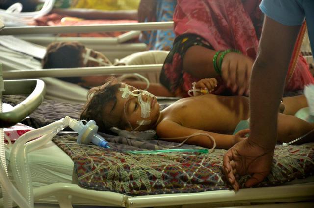 Children receive treatment in the encephalitis ward at Baba Raghav Das Medical College Hospital in Gorakhpur on Monday. (PTI) Children receive treatment in the encephalitis ward at Baba Raghav Das Medical College Hospital in Gorakhpur on Monday. (PTI)