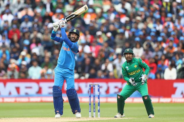Yuvraj Singh of India hits to the offside as wicketkeeper Sarfraz Ahmed looks on during the ICC Champions Trophy match between India and Pakistan at Edgbaston on June 4, 2017 in Birmingham, England. (Getty Images) Yuvraj Singh of India hits to the offside as wicketkeeper Sarfraz Ahmed looks on during the ICC Champions Trophy match between India and Pakistan at Edgbaston on June 4, 2017 in Birmingham, England. (Getty Images)