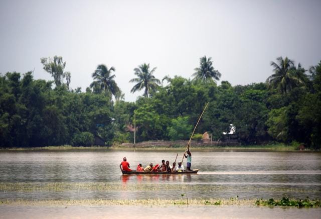 Villagers ride a boat in a flood-affected area in Saptari district, Nepal, on August 14, 2017. (Reuters) Villagers ride a boat in a flood-affected area in Saptari district, Nepal, on August 14, 2017. (Reuters)