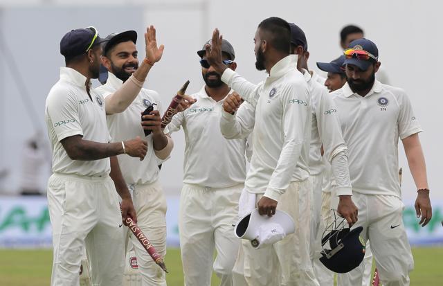 India's captain Virat Kohli, second left, celebrates with teammates as they leave the ground after their win over Sri Lanka in the third cricket Test match in Pallekele, Sri Lanka, Monday, Aug. 14, 2017. India won the match by an innings and 171 runs. (AP) India's captain Virat Kohli, second left, celebrates with teammates as they leave the ground after their win over Sri Lanka in the third cricket Test match in Pallekele, Sri Lanka, Monday, Aug. 14, 2017. India won the match by an innings and 171 runs. (AP)