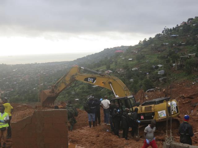 Rescue workers search for survivors following a mudslide in Regent, east of Freetown, Sierra Leone, Monday, Aug. 14, 2017. (AP) Rescue workers search for survivors following a mudslide in Regent, east of Freetown, Sierra Leone, Monday, Aug. 14, 2017. (AP)