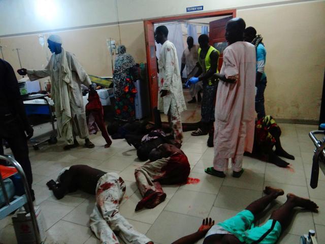 Injured victims of a female suicide bomber lie on the floor awaiting medical attention as beds were no longer available at a Maiduguri hospital in northeastern Nigeria on August 15, 2017. (AFP)