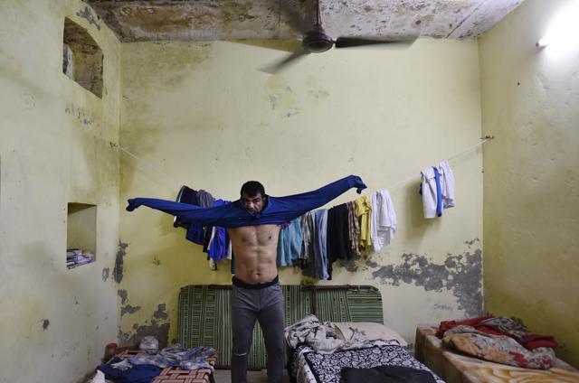 Virender Singh shares a small room inside his akhara at Sadar Bazar, Old Delhi. (Ravi Choudhary / HT PHOTO) Virender Singh shares a small room inside his akhara at Sadar Bazar, Old Delhi. (Ravi Choudhary / HT PHOTO)