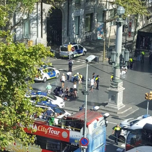 Police and emergency services attend to injured persons at the scene after a van crashed into pedestrians near the Las Ramblas avenue in central Barcelona, Spain August 17, 2017, in this still image from a video obtained from social media. (REUTERS) Police and emergency services attend to injured persons at the scene after a van crashed into pedestrians near the Las Ramblas avenue in central Barcelona, Spain August 17, 2017, in this still image from a video obtained from social media. (REUTERS)