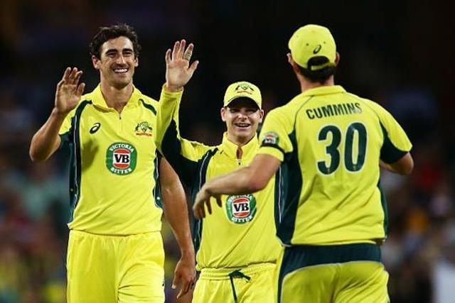 Mitchell Starc of Australia (L) celebrates with Steve Smith (C) and Pat Cummins (R) after taking the wicket of Umar Akmal of Pakistan during game four of the One Day International series between Australia and Pakistan at Sydney Cricket Ground on January 22, 2017 in Sydney. (Getty Images) Mitchell Starc of Australia (L) celebrates with Steve Smith (C) and Pat Cummins (R) after taking the wicket of Umar Akmal of Pakistan during game four of the One Day International series between Australia and Pakistan at Sydney Cricket Ground on January 22, 2017 in Sydney. (Getty Images)