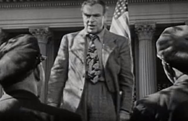 A still from the film shows a man saying minorities are taking away Americans’ jobs.