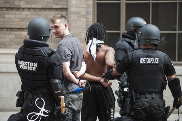 Counter-Protestors Boston 'Free Speech' march are arrested in Bolyston Street near the Boston Commons on August 19, 2017, in Boston. (AFP) Counter-Protestors Boston 'Free Speech' march are arrested in Bolyston Street near the Boston Commons on August 19, 2017, in Boston. (AFP)
