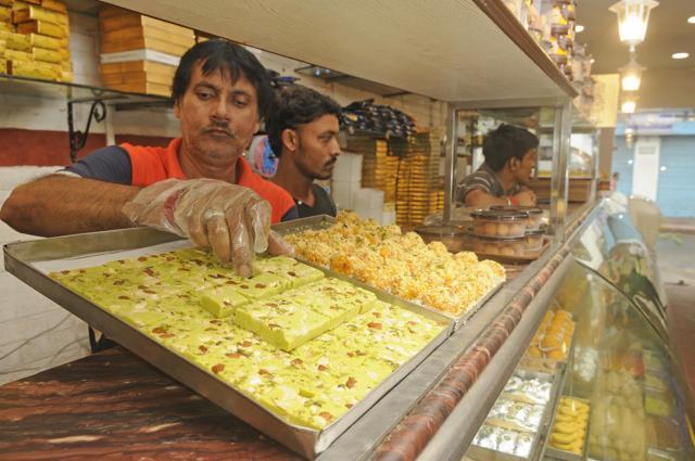 Use of almond, or even saffron flakes, in traditional Bengali sweets has added to price escalation under GST rules. (Samir Jana/HT PHOTO) Use of almond, or even saffron flakes, in traditional Bengali sweets has added to price escalation under GST rules. (Samir Jana/HT PHOTO)