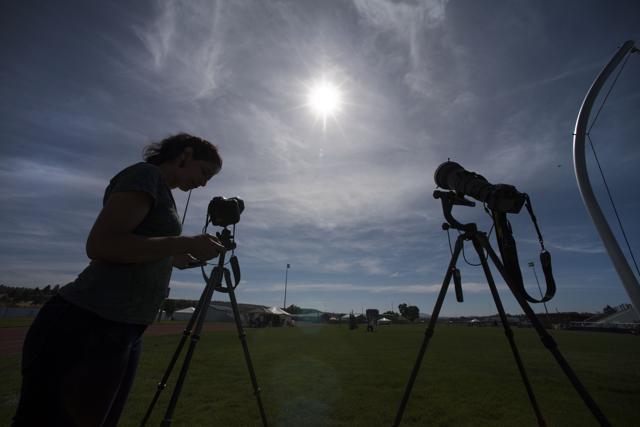 Aubrey Gemignani, a photographer with NASA, tests her camera equipment at the Lowell Observatory Solar Eclipse Experience August 20, 2017 in Madras, Oregon. (AFP Photo) Aubrey Gemignani, a photographer with NASA, tests her camera equipment at the Lowell Observatory Solar Eclipse Experience August 20, 2017 in Madras, Oregon. (AFP Photo)