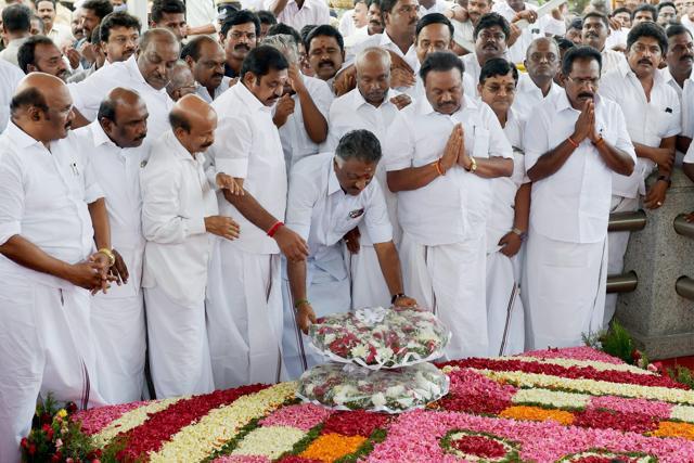 Tamil Nadu Chief Minister K Palaniswami and Dy CM O Panneerselvam paying tributes at the memorial of J Jayalalithaa following merger of their factions in Chennai on Monday. (PTI) Tamil Nadu Chief Minister K Palaniswami and Dy CM O Panneerselvam paying tributes at the memorial of J Jayalalithaa following merger of their factions in Chennai on Monday. (PTI)