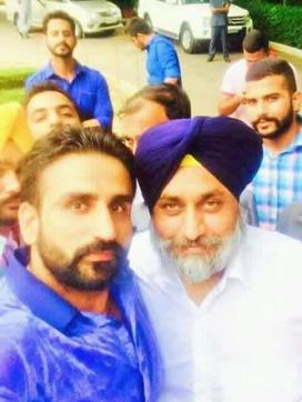 Gangster Gurjot Singh Garcha taking a selfie with former Punjab deputy CM Sukhbir Singh Badal. (HT File) Gangster Gurjot Singh Garcha taking a selfie with former Punjab deputy CM Sukhbir Singh Badal. (HT File)