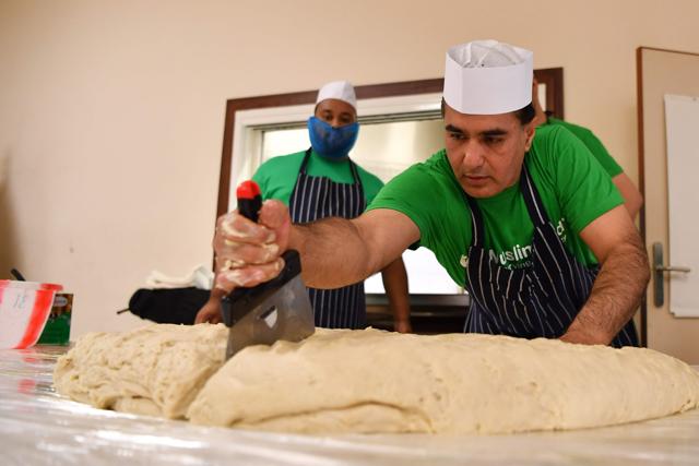 The samosa will go to feed the homeless in the neighbourhood as part of the traditional good deeds associated with the Muslim festival of Eid al-Adha. (AFP Photo) The samosa will go to feed the homeless in the neighbourhood as part of the traditional good deeds associated with the Muslim festival of Eid al-Adha. (AFP Photo)
