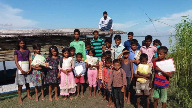 Students in front of a “floating school” in Assam. (Utpal Parashar/HT Photo) Students in front of a “floating school” in Assam. (Utpal Parashar/HT Photo)