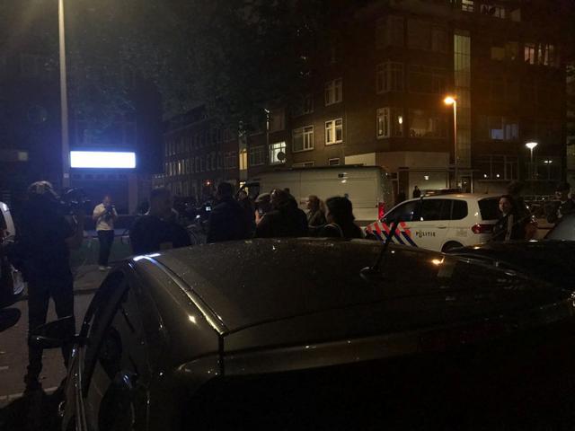 People gather at the scene where police are investigating a van with Spanish licence plates containing gas canisters which was found near a Rotterdam venue where a rock concert was cancelled, in this handout picture obtained by Reuters August 23, 2017. (REUTERS) People gather at the scene where police are investigating a van with Spanish licence plates containing gas canisters which was found near a Rotterdam venue where a rock concert was cancelled, in this handout picture obtained by Reuters August 23, 2017. (REUTERS)