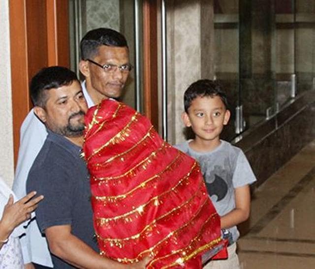 Sanjay Dutt’s son Shahraan along with the Ganesha idol.