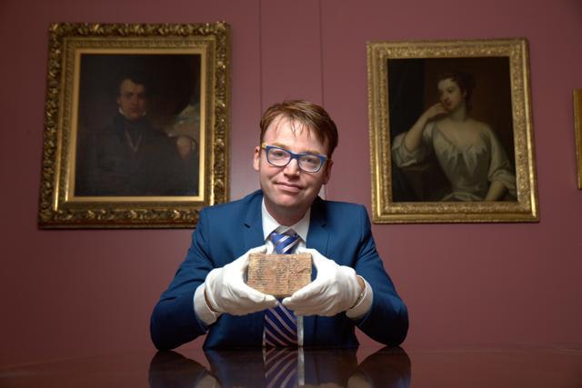 Dr Daniel Mansfield with the Plimpton 322 tablet. (UNSW/Andrew Kelly) Dr Daniel Mansfield with the Plimpton 322 tablet. (UNSW/Andrew Kelly)