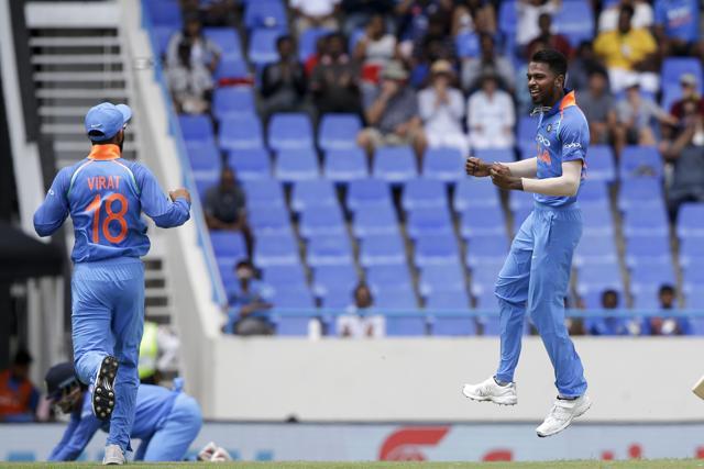 Hardik Pandya, right, celebrates with team captain Virat Kohli dismissing West Indies' Shai Hope during their fourth ODI cricket match at the Sir Vivian Richards Stadium in North Sound, Antigua and Barbuda, Sunday, July 2, 2017. (AP) Hardik Pandya, right, celebrates with team captain Virat Kohli dismissing West Indies' Shai Hope during their fourth ODI cricket match at the Sir Vivian Richards Stadium in North Sound, Antigua and Barbuda, Sunday, July 2, 2017. (AP)