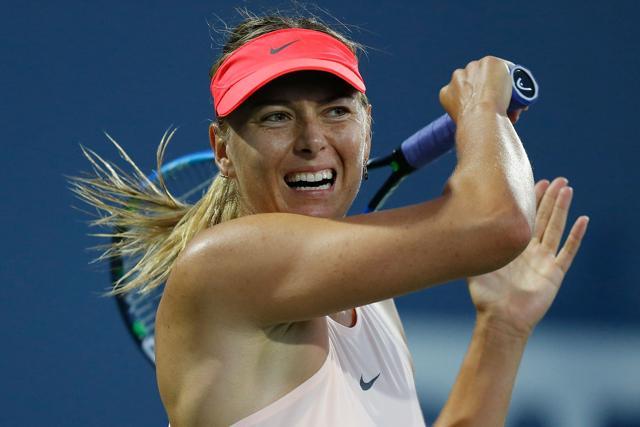 Maria Sharapova competes against Jennifer Brady at Stanford University Taube Family Tennis Stadium. (AFP) Maria Sharapova competes against Jennifer Brady at Stanford University Taube Family Tennis Stadium. (AFP)