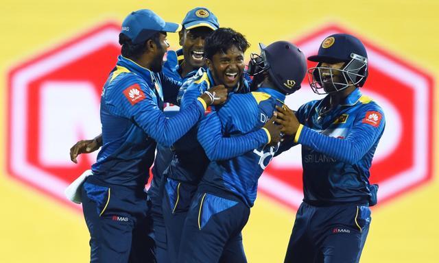 Sri Lanka's Akila Dananjaya (C) celebrates with teammates after dismissing India batsman KL Rahul. (AFP) Sri Lanka's Akila Dananjaya (C) celebrates with teammates after dismissing India batsman KL Rahul. (AFP)