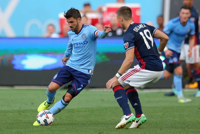 New York City FC forward David Villa (7) plays the ball against New England Revolution defender Antonio Dalamea Mlinar (19) during the first half at Yankee Stadium. (USA Today Sports) New York City FC forward David Villa (7) plays the ball against New England Revolution defender Antonio Dalamea Mlinar (19) during the first half at Yankee Stadium. (USA Today Sports)