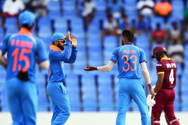 Hardik Pandya celebrates with captain Virat Kohli after dismissing West Indies' Kyle Hope during the third One Day International (ODI) match between West Indies and India, at the Sir Vivian Richards Cricket Ground in St. John's, Antigua, on June 30, 2107. (AFP) Hardik Pandya celebrates with captain Virat Kohli after dismissing West Indies' Kyle Hope during the third One Day International (ODI) match between West Indies and India, at the Sir Vivian Richards Cricket Ground in St. John's, Antigua, on June 30, 2107. (AFP)