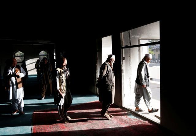 Afghans walk inside a Shia mosque after Friday's attack in Kabul, Afghanistan, on August 26, 2017. (Reuters) Afghans walk inside a Shia mosque after Friday's attack in Kabul, Afghanistan, on August 26, 2017. (Reuters)