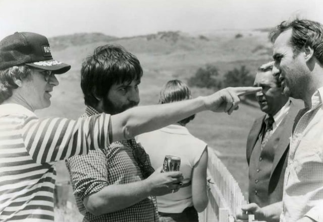 Steven Spielberg (L) and Tobe Hooper (with Coke can). (IMDb)