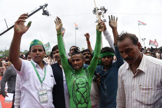 An RJD worker with the party symbol lantern painted on his chest at the RJD rally in Patna on Sunday. (HT photo / Santosh Kumar) An RJD worker with the party symbol lantern painted on his chest at the RJD rally in Patna on Sunday. (HT photo / Santosh Kumar)
