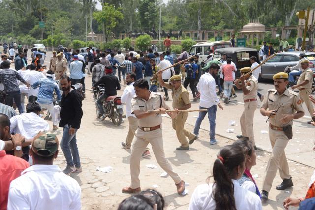 Police try to disperse students in Kota. (HT Photo) Police try to disperse students in Kota. (HT Photo)