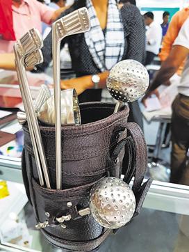 A golf bar set with stirrers, ice-breaker and cork opener costs Rs 1,600 in retail; STALL 12-04 B. (Henna Rakheja/HT Photo) A golf bar set with stirrers, ice-breaker and cork opener costs Rs 1,600 in retail; STALL 12-04 B. (Henna Rakheja/HT Photo)