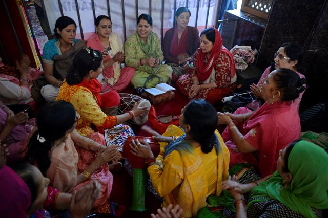 AThe rituals of narrating a ‘Punn’ story (traditional ritual in Kashmir) by the eldest lady in the house is an integral part of the Ganesh festival in the Nehru household in Baner. (AFP) AThe rituals of narrating a ‘Punn’ story (traditional ritual in Kashmir) by the eldest lady in the house is an integral part of the Ganesh festival in the Nehru household in Baner. (AFP)