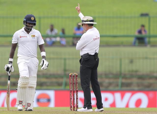 Angelo Mathews is given out during the third day's play of the third cricket Test match between Sri Lanka and India in Pallekele, Sri Lanka, Aug. 14, 2017. (AP)