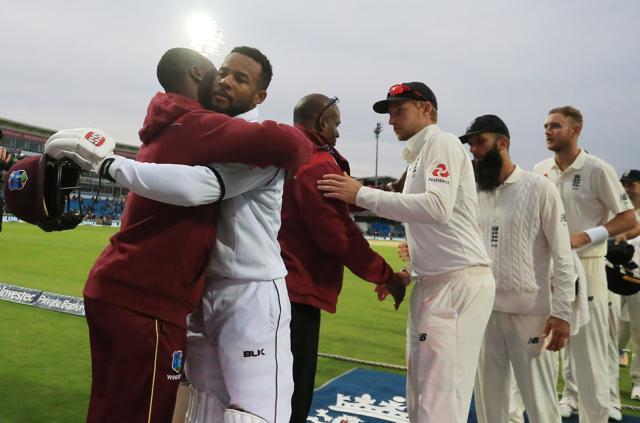 West Indies' Shai Hope (2L) is followed by England's captain Joe Root and the England squad as he leaves the field after winning the second cricket Test match on the fifth day at Headingley on August 29, 2017. (AFP) West Indies' Shai Hope (2L) is followed by England's captain Joe Root and the England squad as he leaves the field after winning the second cricket Test match on the fifth day at Headingley on August 29, 2017. (AFP)