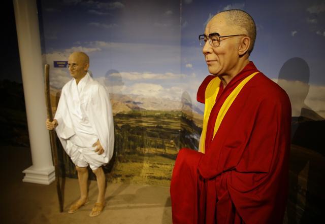 Wax figures of the Dalai Lama, right, and Mahatma Gandhi stand at the Dreamland Wax Museum. (AP) Wax figures of the Dalai Lama, right, and Mahatma Gandhi stand at the Dreamland Wax Museum. (AP)