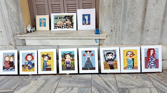 Small framed paintings for sale on a street, at the bottom of the Parthenon complex (Vinod Advani)