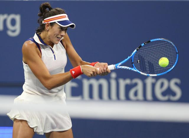 Garbine Muguruza of Spain returns a shot to Ying-Ying Duan of China. (USA Today Sports) Garbine Muguruza of Spain returns a shot to Ying-Ying Duan of China. (USA Today Sports)