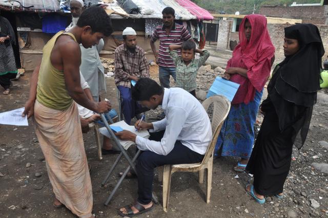 A UNHCR aid worker gathers details about the Rohingya muslim refugees from Mayanmar at a makeshift camp on World Refugee Day in the outskirts of the Indian city Jammu on June 20, 2017. (AFP) A UNHCR aid worker gathers details about the Rohingya muslim refugees from Mayanmar at a makeshift camp on World Refugee Day in the outskirts of the Indian city Jammu on June 20, 2017. (AFP)