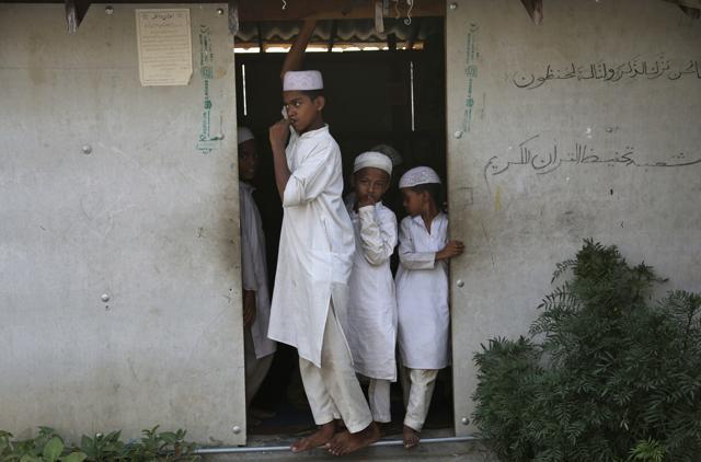 Rohingya refugee children attend a madrasa at a camp set up for the refugees on the outskirts of Jammu, India, Wednesday, Aug. 16,2017. (AP) Rohingya refugee children attend a madrasa at a camp set up for the refugees on the outskirts of Jammu, India, Wednesday, Aug. 16,2017. (AP)