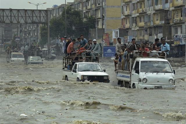Pakistani commuters travel on a flooded street following a heavy rainfall in Karachi, Pakistan, Thursday, Aug. 31, 2017. Monsoon rains in Pakistan's port city of Karachi left at least eight people dead in flood-related mishaps, officials said Thursday. (AP) Pakistani commuters travel on a flooded street following a heavy rainfall in Karachi, Pakistan, Thursday, Aug. 31, 2017. Monsoon rains in Pakistan's port city of Karachi left at least eight people dead in flood-related mishaps, officials said Thursday. (AP)