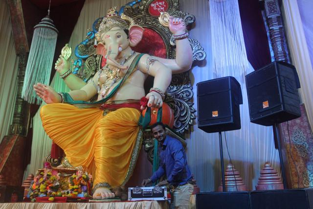 Hemant Patel has been handling the music at Bhavershwarcha Raja in Ghatkopar for seven years. The toughest part, he says, is to ensure that the music is played within the prescribed decibel levels. (Praful Gangurde/HT Photo )