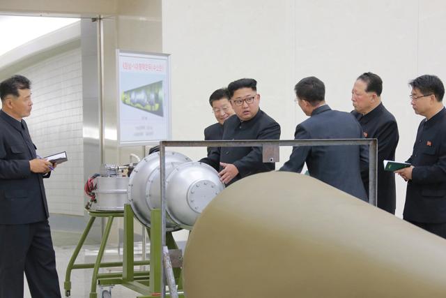 North Korean leader Kim Jong Un provides guidance on a nuclear weapons programme in this undated photo released by North Korea's Korean Central News Agency (KCNA) in Pyongyang. (REUTERS) (REUTERS)