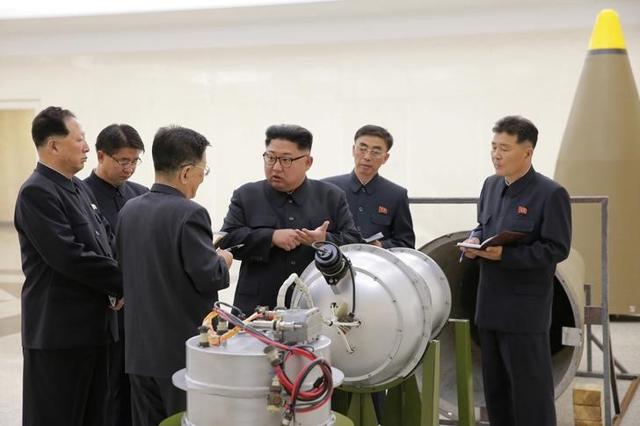 North Korean leader Kim Jong Un provides guidance on a nuclear weapons programme in this undated photo released by North Korea's Korean Central News Agency (KCNA) in Pyongyang. (REUTERS)