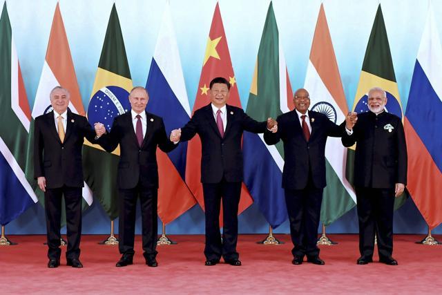 BRICS leaders from left: Brazilian President Michel Temer, Russian President Vladimir Putin, Chinese President Xi Jinping, South African President Jacob Zuma, and Indian Prime Minister Narendra Modi. (AP) BRICS leaders from left: Brazilian President Michel Temer, Russian President Vladimir Putin, Chinese President Xi Jinping, South African President Jacob Zuma, and Indian Prime Minister Narendra Modi. (AP)