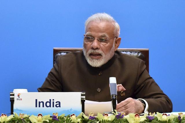 Indian Prime Minister Narendra Modi delivers a speech ahead of the signing ceremony of the BRICS Business Council at the BRICS Summit at Xiamen in Fujian province of China on September 4, 2017. (AP) Indian Prime Minister Narendra Modi delivers a speech ahead of the signing ceremony of the BRICS Business Council at the BRICS Summit at Xiamen in Fujian province of China on September 4, 2017. (AP)