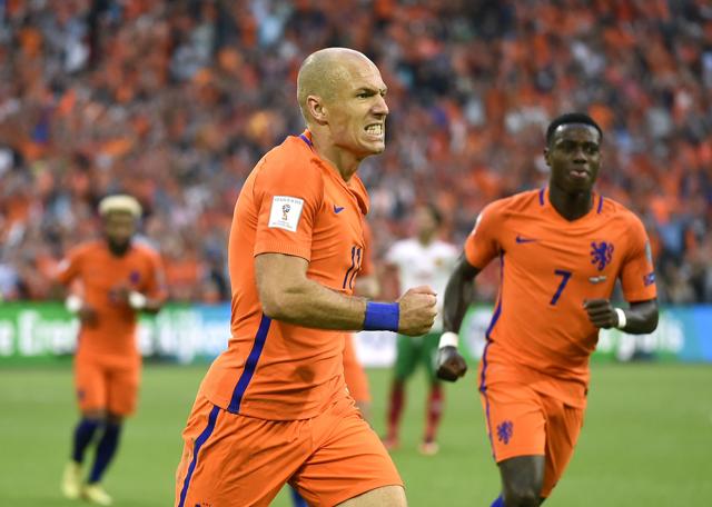 Netherlands forward Arjen Robben (C) celebrates after scoring against Bulgaria. (AFP) Netherlands forward Arjen Robben (C) celebrates after scoring against Bulgaria. (AFP)