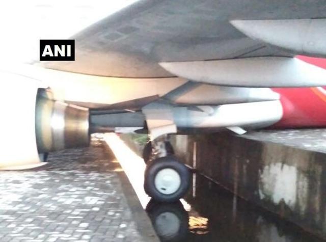 A view of the aircraft that veered off the taxiway at the Kochi airport. (Photo: ANI Twitter)