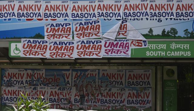 DUSU election posters at South Campus deface a bus stop. (Vipin Kumar/HT PHOTO) DUSU election posters at South Campus deface a bus stop. (Vipin Kumar/HT PHOTO)