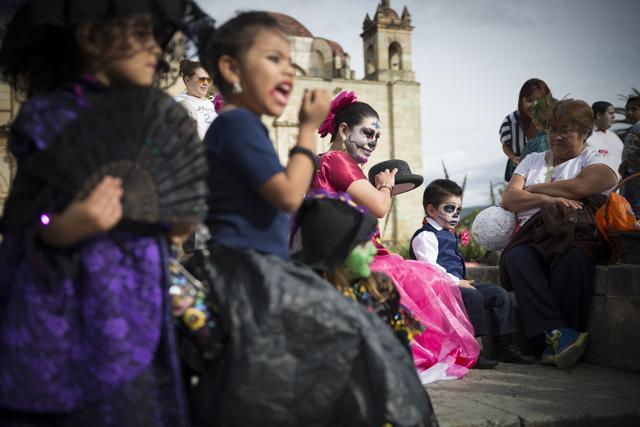 The Day of the Dead is a colourful and festive holiday in Mexico that honours the memory of fallen friends, family members and ancestors. (AFP) The Day of the Dead is a colourful and festive holiday in Mexico that honours the memory of fallen friends, family members and ancestors. (AFP)