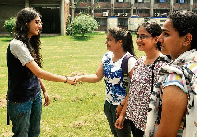 SFS presidential candidate Hassanpreet Kaur interacting with students. (Karun Sharma/HT)